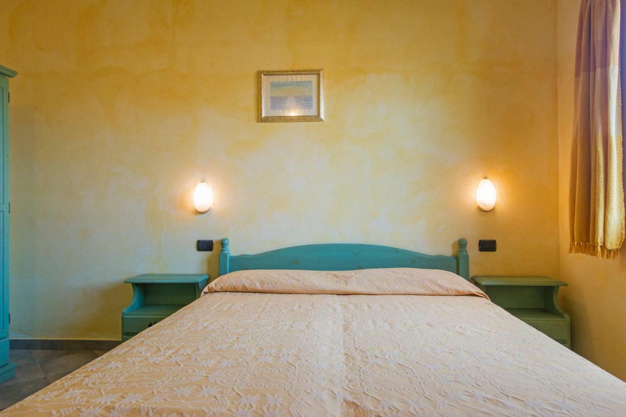 Camere Magnolia Cala Liberotto Bagian luar foto